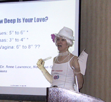 Lannie giving a lecture in front of a projected slide